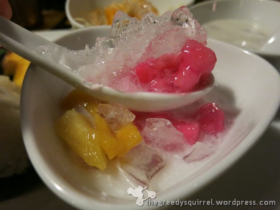 Tab Tim Grob Crunchy Water Chestnuts heavily coated with Tapioca Flour and served in Coconut Milk with Shaved Ice